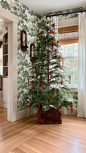 I wanted my Christmas tree to feel soft, nostalgic, and a little unexpected. Baby’s breath for texture, icicles for sparkle, bows for tradition… and a vintage doctor’s bag as the perfect tree collar. Comment ‘TREE’ for all the sources to be sent to your DM. #christmastree #christmasdecor #thrifting #christmas #treedecor #vintagetree | Painting by the Penny