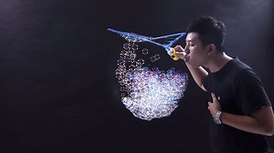 Man Sets Guinness Worlds Record for Most Soap Bubbles Blown Inside a Large Soap Bubble