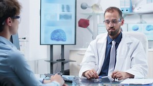 Doctor demonstrates medical innovation with AR Tech - Free Stock Video