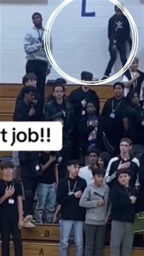 Darius Brown the Alien Clown dances in the middle of the national anthem