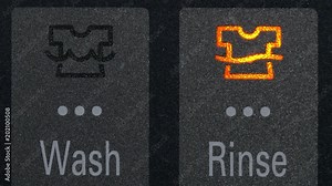 Close up of washing machine control panel blinking wash indicator. Stock Video