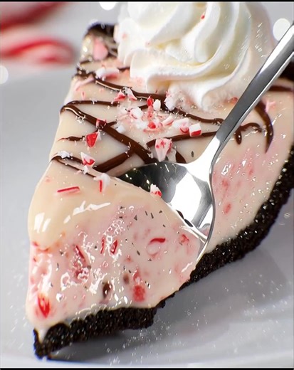 No-Bake Candy Cane Pie 🎅 A creamy peppermint dream with Oreo crust, white chocolate ganache, and crushed candy canes! Perfect for Christmas parties & holiday dessert tables. Save this festive favorite now! ❄️ #CandyCanePie #HolidayDessert #NoBakeRecipes #PeppermintDessert | The Cuisine Mile