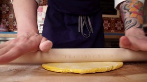 Executive chef Michael Fusano of Sfoglina in the Van Ness neighborhood of Washington, D.C., shows how the restaurant creates the pasta behind its Piemontese 40 yolk hand cut pappardelle primavera. | Washington Post