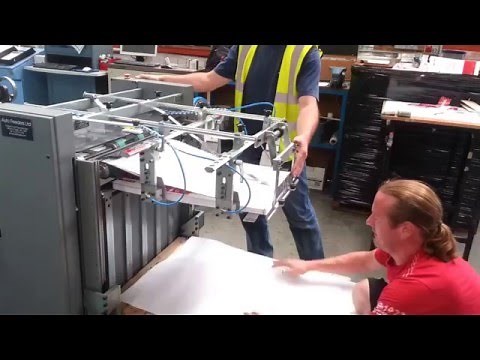 Sheet Stacker connected to a Sheeter. Paper Stacker. Sheet Delivery