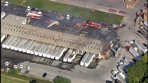 Flames out after massive warehouse fire that sent HFD captain to hospital, fire chief says