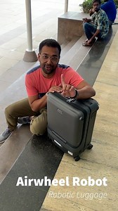 6.2M views · 21K reactions | This bag follows you! Gadgetwala's "Gadget of the day" is this super cool "Airwheel Robotic Luggage", a bag that follows you wherever you go. Biometrics make it secure and the smart Bracelet ensures it cannot be robbed. #news #india #blogger #robotic #luggage #gagdets #futuristic #technology #trending #airwheel | Life.Today | Facebook