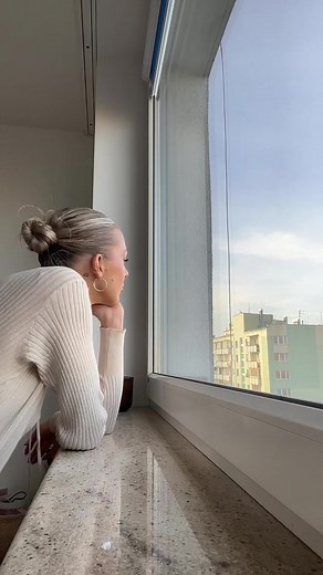 Cityscape Views from a High-Rise Apartment Window