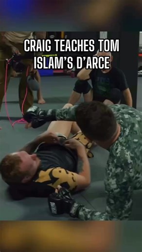 9.8K views · 61 reactions | Craig Jones goes over some of the important details behind Islam Makhachev’s D’arce Choke with Tom Aspinall. | Red Corner MMA | Facebook