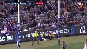 Goal umpire Roffey keeps cool under fire