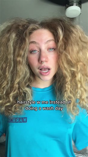 Messy Updo Curly Hair Tutorial by Jessica Eid