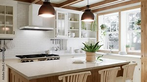 The interior of a large U-shaped kitchen with a wooden front and a large island