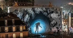 watch: JR animates his paris opera cavern facade with 'chiroptera' shadow-light performance