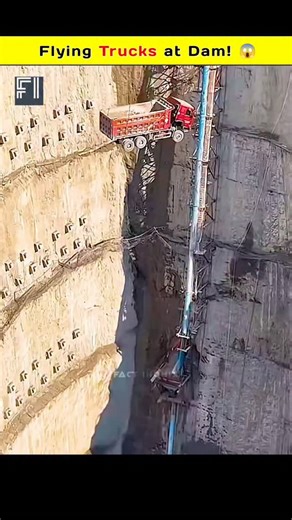 Fact Inomix on Instagram: "Why Excavators Fly at Dam Sites? 🚧 At massive dam construction sites, you might see trucks and excavators lifted high into the air — but why? The secret lies in a brilliant engineering solution: *Slope Anchor Locks*. These square anchor boxes drilled deep into the mountain stabilize weak rock layers and transfer the load to stronger layers, ensuring the dam’s strength and longevity. Without them, the pressure of rushing water could move mountains and even break the da
