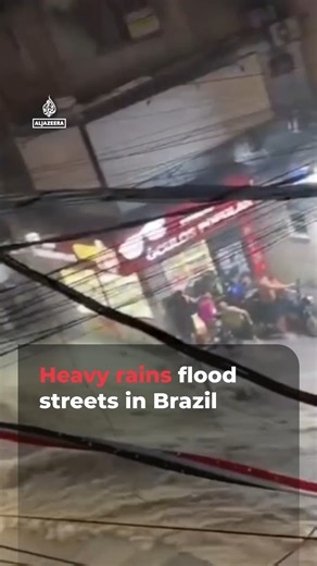 Video shows torrents of water gushing through the streets of Rocinha, Brazil, after heavy rains triggered severe flooding. | Al Jazeera English