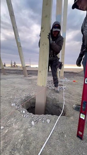 The process of installing post protectors and setting posts on 3 walls of our new HQ!