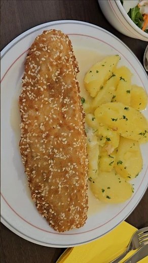 Alaska pollock fillet in sesame breading, served with lemon sauce and potatoes 😋😋😋