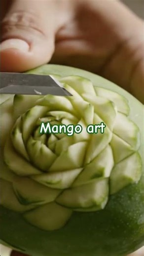 “Turning a simple green mango into a beautiful flower masterpiece…