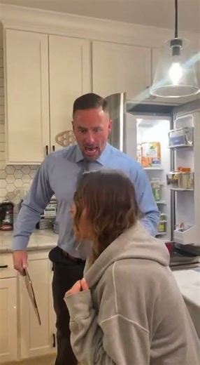 Tense Family Confrontation in Intense Kitchen Scene