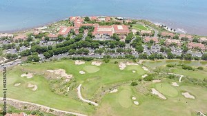 Experience the mesmerizing 4K aerial view of Laguna Beachs golf course and resort at sunrise, highlighting the vibrant landscape and stunning coastline, providing an engaging visual treat
