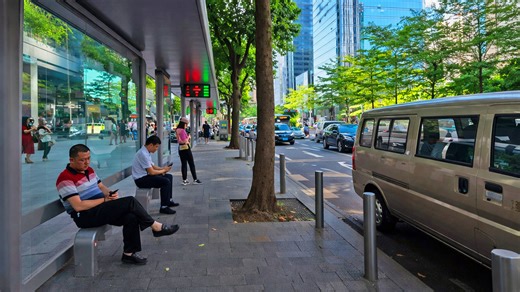 Waiting at bus stop in China
