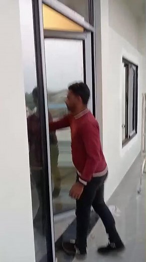 aluminum and glass door (surface protection tape not removed)