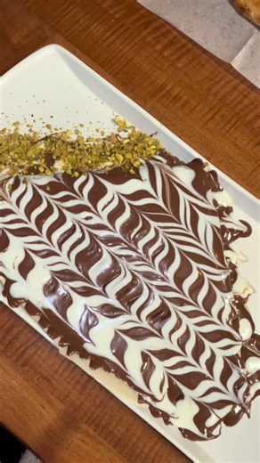 ✨grand opening✨ Yaffa Cafe !! Located at 3708 Fishinger Blvd, Hilliard Ohio this specialty cafe quickly became one of our newest favorites☕️ through the doors and up the stairs is a beautiful, inviting space to enjoy food, drinks & make memories. We grabbed a strawberry Dubai chocolate cup to share🍓 I got a Nutella covered crepe, with a strawberry açaí refresher with strawberry popping boba😋 my fiance got a loaded Mexican pizza & a mocha frappe! Everything was delicious and made to order. Yaff