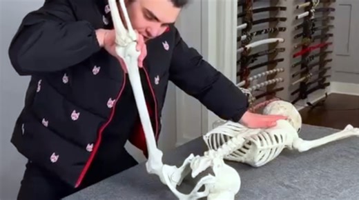 Man Gives Skeleton a Good Chiropractic Cracking