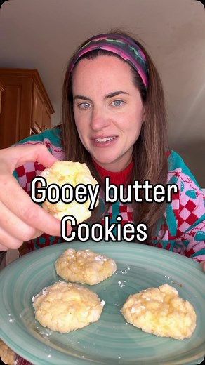 Gooey butter cookies! A St. Louis recipe! Episode 6 of my Christmas cookie series 🍪 Ingredients: 1/2 cup butter (1 stick) 8 oz cream cheese 1/2 tsp vanilla extract 1 egg 1 box yellow cake mix Powdered sugar to roll How to: Mix butter and cream cheese together. Add in egg and vanilla and mix well. Add in one box of yellow cake mix and stir. Refrigerate dough for one hour. After the hour is up using a 1 inch cookie scooper scoop and drop dough into a bowl of powdered sugar. Roll around coating th