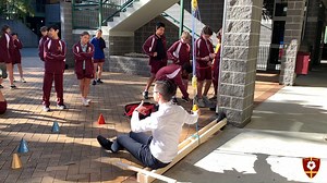 Today our Year 7 students have been applying their physics knowledge about levers and pulleys. In a series of experiments, they’ve observed how different pulleys, levers and fulcrum positions alter the effort needed to lift a range of heavy loads—from a sack of filled water bottles (approximately 18kg worth) to their teacher, Mr Boman (70kg)! Due to the force multiplier lever in use, each load was reduced by at least half each time, much to the surprise of the students. What a wonderful way to s