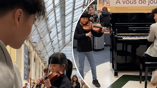 Train station pianist’s surprising duet with 8-year-old violinist