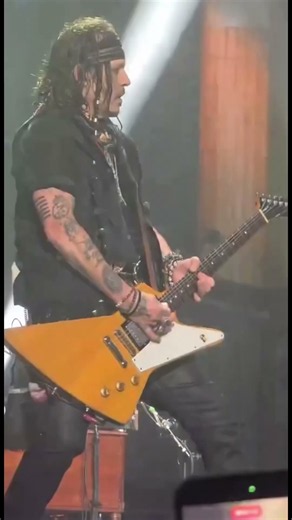 Johnny Depp performing with the Hollywood Vampires