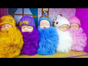 Learns to Play with baby dolls in the Dollhouse