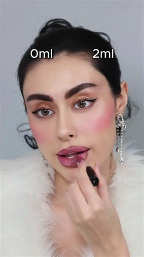 The art of the overline. 🎨✨ Achieving that 2ml look with just two products. #LipHacks #MakeupTransformation #LipFillerLook #OverlinedLips #BeautySecret