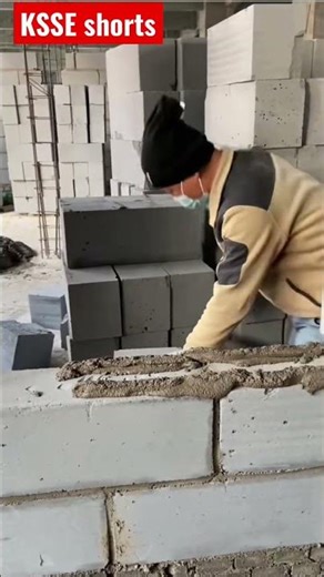 Light-weight concrete block laying technique for a residential building