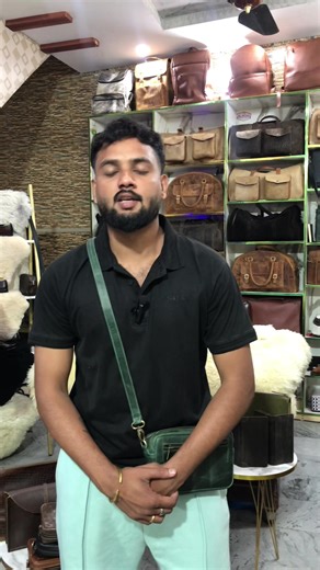 Hand Pouch and Cross Body Bag in Wax Pull Up Leather