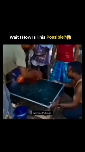 Sᴜᴍɪᴛ on Instagram: "street performer executing a classic three-shell game, rapidly shuffling red and blue bowls to hide a white ball while a crowd bets, creating optical confusion through misdirection. The clip has exploded to over 2 million views in under 24 hours, with 112 replies mostly decoding the illusion—such as a jump cut at 0:14 seconds and duplicate balls concealed by pressing bowls against the table. Psychological research on change blindness, like Simons and Rensink's 2005 study in 