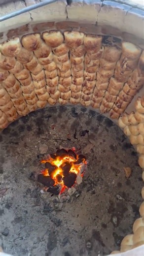 Tandoor – An Ancient Clay Oven and the Traditional Way of Baking Bread Rolls