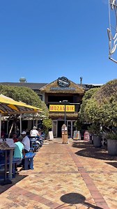 Mozambique in Hermanus 🇲🇿🌊 Flame-grilled seafood with a view. Would you eat here? | Cape Town Getaway
