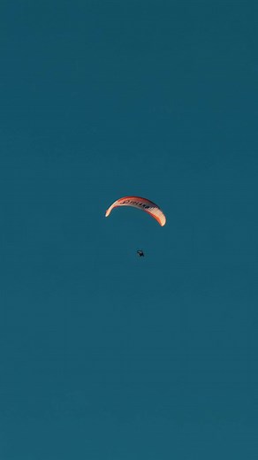 Up in the air. Zero doubts. 🪂✨ Different angle, same energy: 2,653 meters above the world, my daughter took off in a tandem paragliding flight — steady breath, clear mind, no fear at all. Some moments say everything without words. 💙 #nofear #paraglidinglife #tandemparagliding #flyfree #2653m