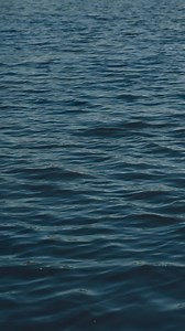 Download Slow motion blue water wave background for free