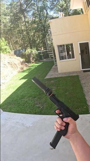 suppressed glock with extended mag