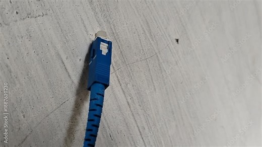 Fiber optic cable (Fiber Optic Drop Core Cable) that uses an SC (Subscriber Connector) connector, which is often used to connect home WiFi internet services.