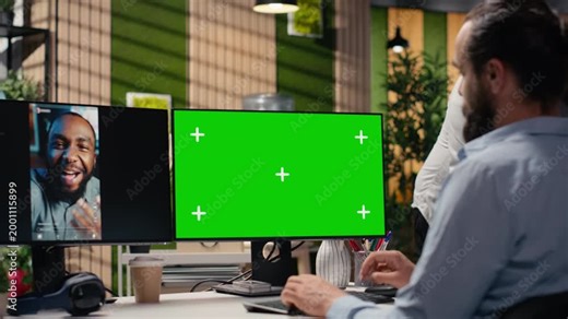 Chroma key screen, PC reels on software, in modern office, startup employee developing marketing strategy used in targeting viral trends and boosting online followers and exposure.