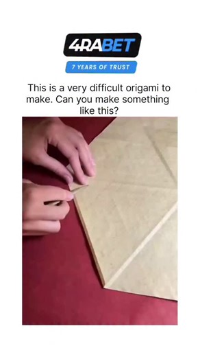 US MeMe🇺🇲 on Instagram: "The post features a 27-second sped-up video of folding a single tan paper sheet into a complex "Star Puff" origami tessellation by Ralf Konrad, creating a flat yet textured hexagonal star pattern through precise valley and mountain folds. This design exemplifies origami's geometric foundations, where repeating units tile the plane via Miura-ori principles, supported by research in the Journal of Computational Geometry showing applications in deployable aerospace struct