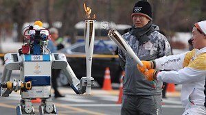 Robot HUBO carries 2018 Winter Olympics torch