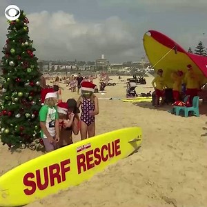 41K views · 854 reactions | This is what Christmas looks like at Bondi Beach in Sydney, where it's currently summer. The temperature at the beach hit 80°F. | CBS News | Facebook