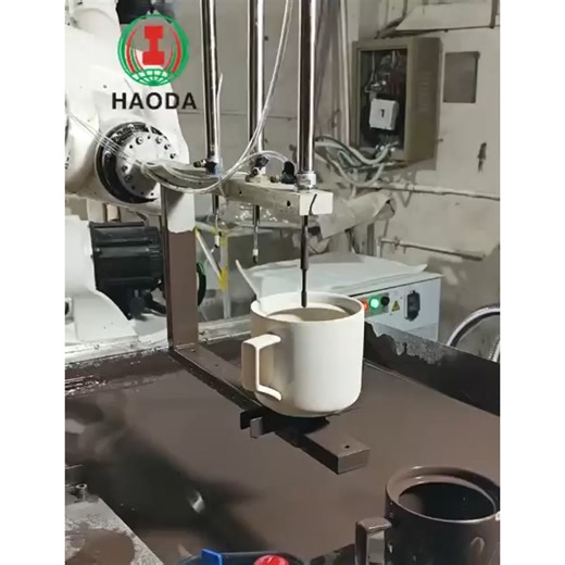 HAODA MACHINE on Instagram: "Robotic Glaze Dipping Machine This machine is an automated solution designed for precise and consistent glaze application on ceramic, porcelain, or pottery products. Equipped with a robotic arm, it enables fully controlled dipping by customizable angle and depth, ensuring uniform coating coverage even on complex shapes. Key Features: 🏅Customizable Workstations – Adaptable to various product sizes and production layouts. 🏆Precision Dipping Control – Adjustable dippi