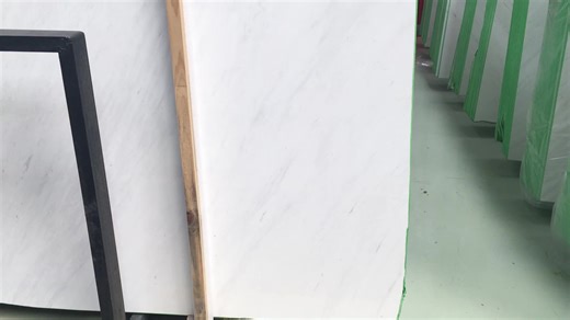 Two-Story Living-Room-Column Cladding Oversized-Slab Calacatta