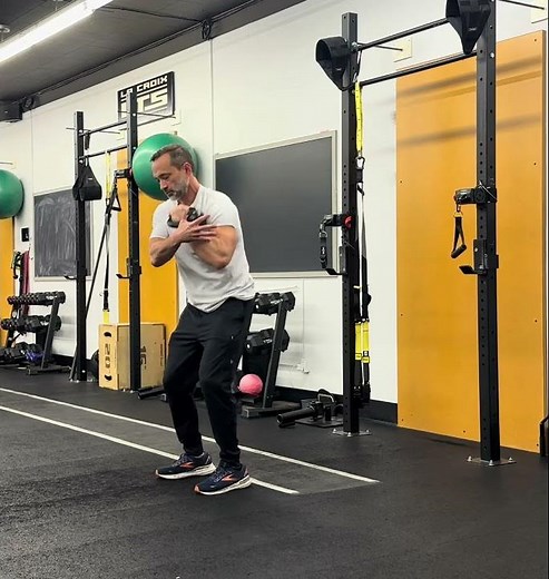 Kettlebell Cradle Squat To Rotational Press