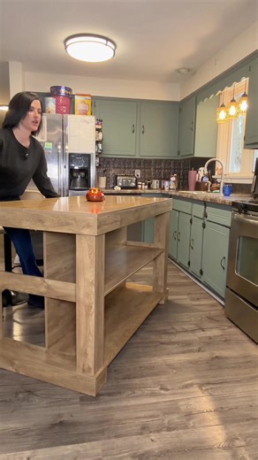 This warm kitchen island completely transformed my kitchen space by allowing me to have more kitchen counter prep space plus an extra table for my family to sit at and even do activities. My kids actually sit here and watch me cook now I’ve pretty much started redecorating my entire kitchen around this kitchen island. ##kitchenisland##midcenturymodernfurniture##kitchenupgrade##cookingprepspace##affordablefurniture